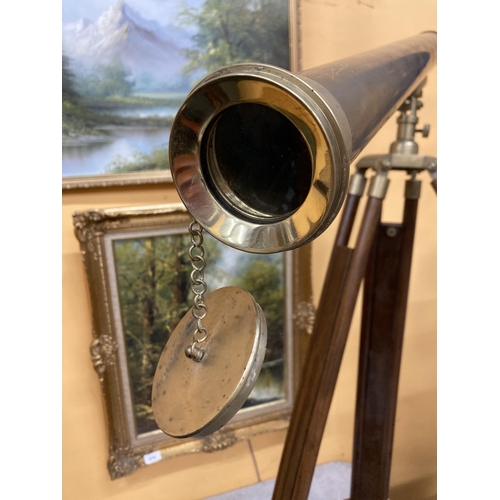 60 - A VINTAGE BRASS TELESCOPE ON A WOOD AND BRASS TRIPOD