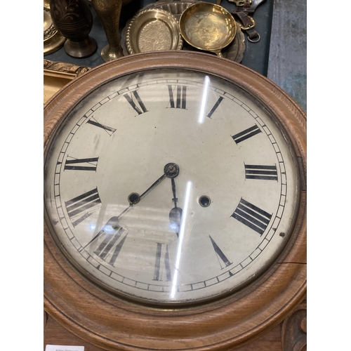 75 - A VICTORIAN STYLE OAK CASED WALL CLOCK WITH PENDULUM