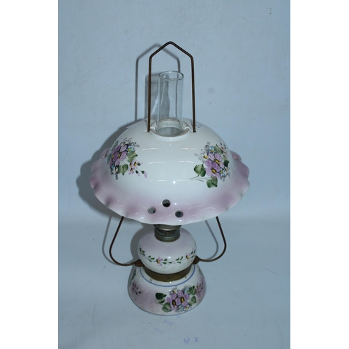 107A - A VINTAGE SIGNED OIL LAMP