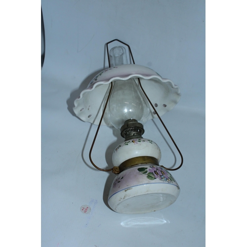 107A - A VINTAGE SIGNED OIL LAMP