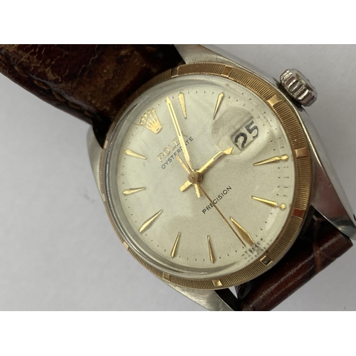 605 - A VINTAGE ROLEX OYSTERDATE PRECISION WRISTWATCH WITH 18CT GOLD BEZEL WITH LEATHER STRAP, NO BOX AND ... 