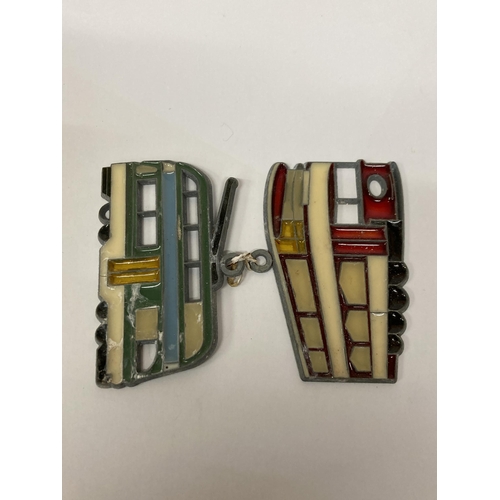 668 - TWO VINTAGE ENAMEL AND LEAD TRAM BADGES