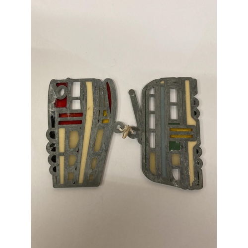 668 - TWO VINTAGE ENAMEL AND LEAD TRAM BADGES