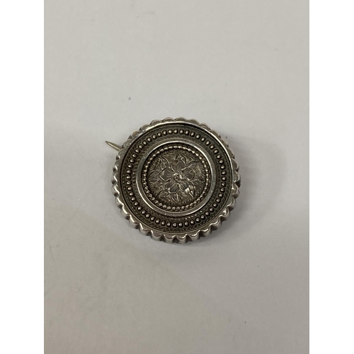 670 - A SMALL SILVER SWEETHEART BROOCH