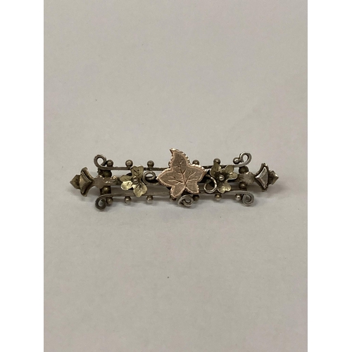 674 - A VICTORIAN SILVER AND GOLD SWEETHEART BROOCH