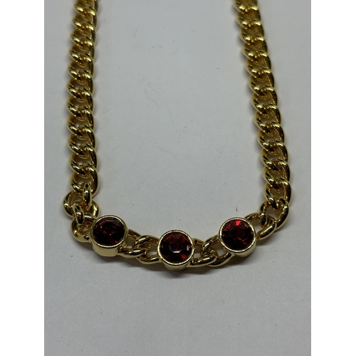 710 - A MONET NECKLACE WITH RED STONES AND A PAIR OF MATCHING EARRINGS