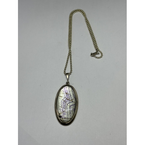 713 - A MARKED SILVER BALL NECKLACE WITH A LARGE  SILVER PENDANT