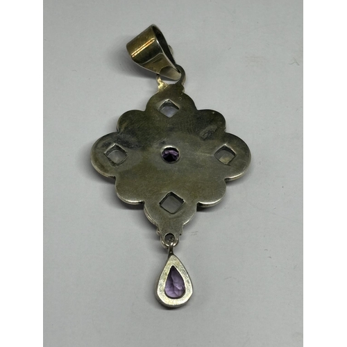 715 - A MARKED SILVER PENDANT WITH PEARLS AND COLOURED STONES