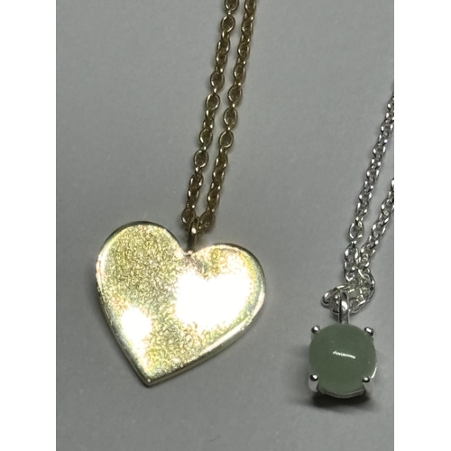 731 - FOUR SILVER PENDANT NECKLACES TO INCLUDE A GOLD PLATED HEART