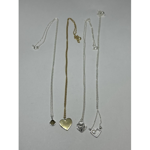 753 - FOUR SILVER PENDANT NECKLACES TOINCLUDE A GOLD PLATED EXAMPLE