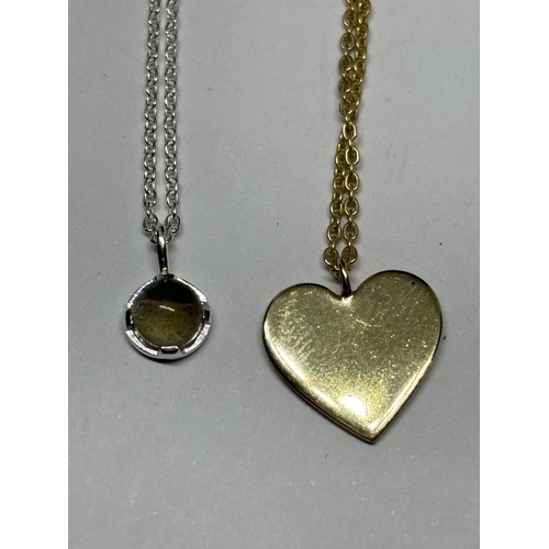 753 - FOUR SILVER PENDANT NECKLACES TOINCLUDE A GOLD PLATED EXAMPLE