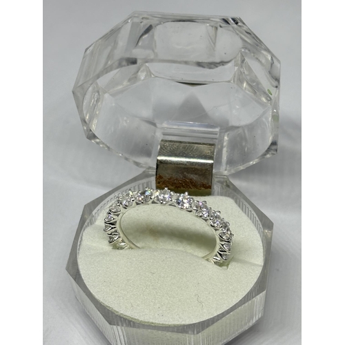 761 - A DECORATIVE CLEARSTONE RING SIZE R IN A PRESENTATION BOX