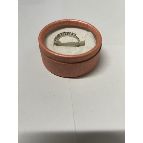 792 - A DRESS RING WITH CUBIC ZIRCONIAS IN A PRESENTATION BOX