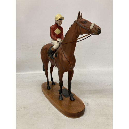 805 - A CONNOISSEUR MODEL BY BESWICK OF RED RUM BRIAN FLETCHER UP ON A WOODEN PLINTH