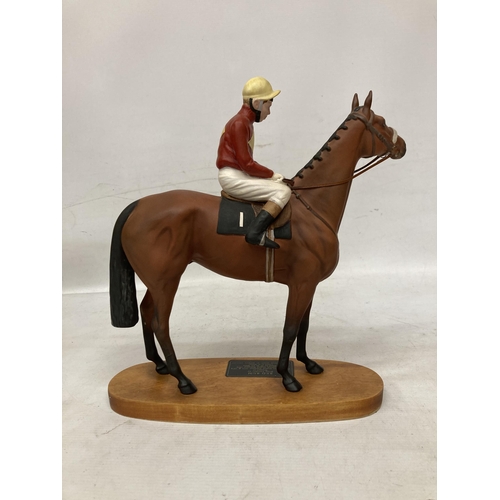 805 - A CONNOISSEUR MODEL BY BESWICK OF RED RUM BRIAN FLETCHER UP ON A WOODEN PLINTH