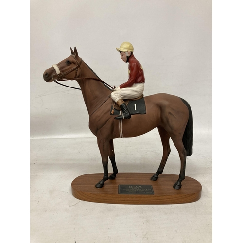 806 - A CONNOISSEUR MODEL BY BESWICK OF RED RUM BRIAN FLETCHER UP ON A WOODEN PLINTH