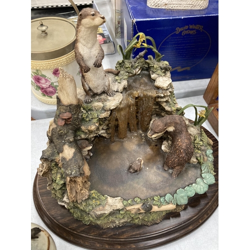 918 - A LARGE OTTER PARADISE ORNAMENT ON PLINTH PLUS PLUS PAST TIMES FAIRY