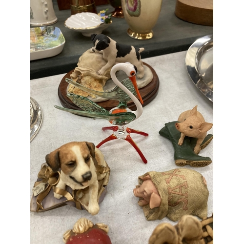 944 - A COLLECTION OF ANIMAL FIGURES TOINCLUDE PENDELFIN RABBITS, COUNTRY ARTISTS DOGS, ETC