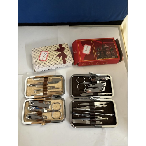 980A - TWO AS NEW AND BOXED MANICURE SETS