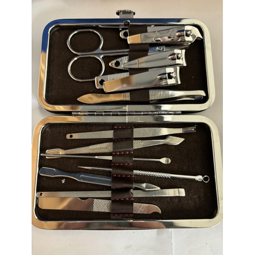 980A - TWO AS NEW AND BOXED MANICURE SETS