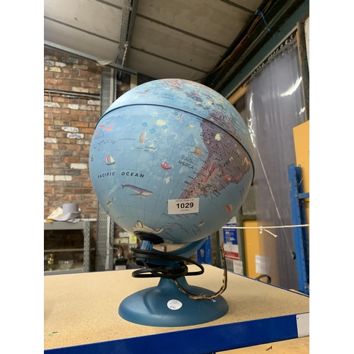 1029 - A VINTAGE ILLUMINATED GLOBE ON A STAND, HEIGHT 38CM