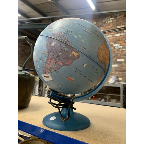 1029 - A VINTAGE ILLUMINATED GLOBE ON A STAND, HEIGHT 38CM