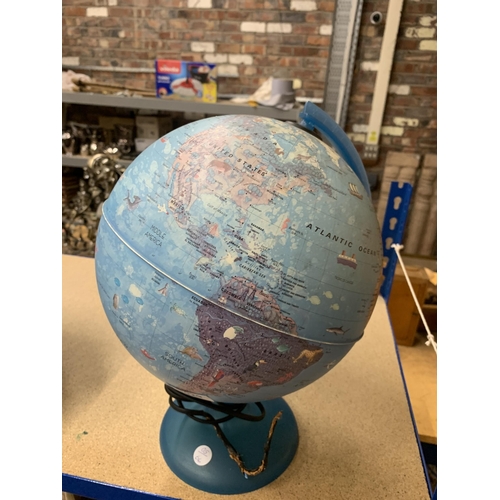 1029 - A VINTAGE ILLUMINATED GLOBE ON A STAND, HEIGHT 38CM