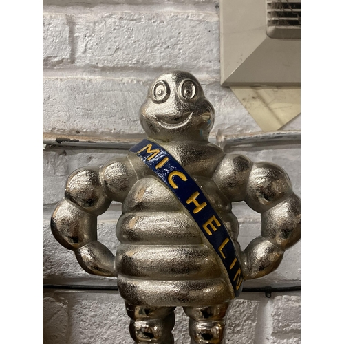 1143 - A CHROME MODEL OF A MICHELIN MAN, HEIGHT 36CM