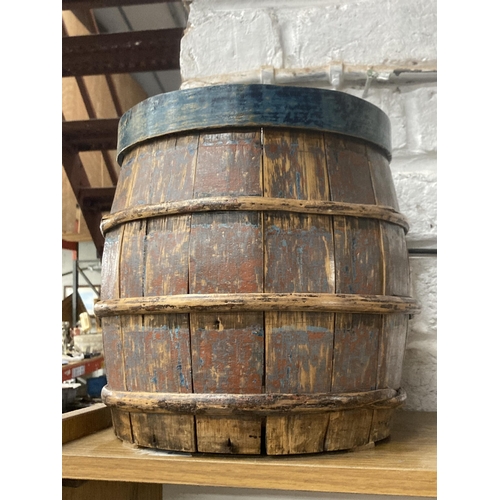 1144 - A WOODEN BARREL PLANT POT, HEIGHT 25CM