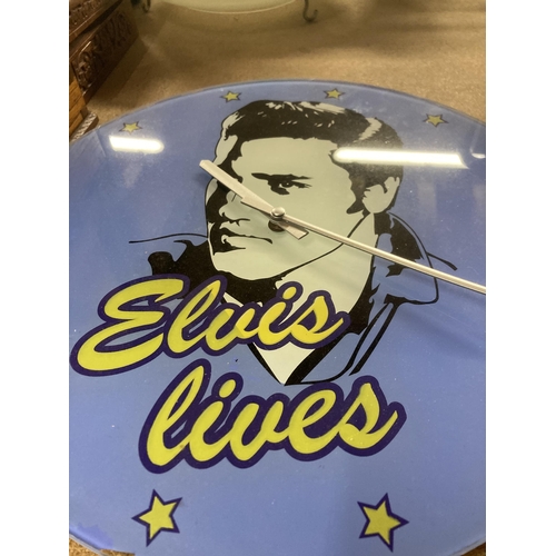 1176 - AN 'ELVIS LIVES' TOUGHENED GLASS WALL CLOCK, DIAMETER 35CM