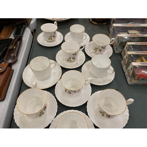 267 - A LARGE QUANTITY OF CHINA CUPS AND SAUCERS