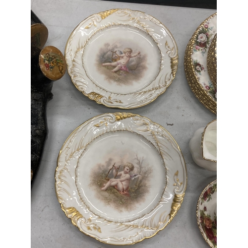 269 - A PAIR OF LIMOGES HANDPAINTED CABINET PLATES, ONE A/F