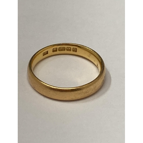 502 - A 22 CARAT YELLOW GOLD HALLMARKED BIRMINGHAM WEDDING RING SIZE J GROSS WEIGHT 3.45 GRAMS