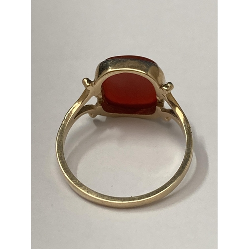 504 - A MARKED 9 CARAT GOLD DRESS RING WITH AMBER COLOURED STONE SIZE Q GROSS WEIGHT 2.79 GRAMS