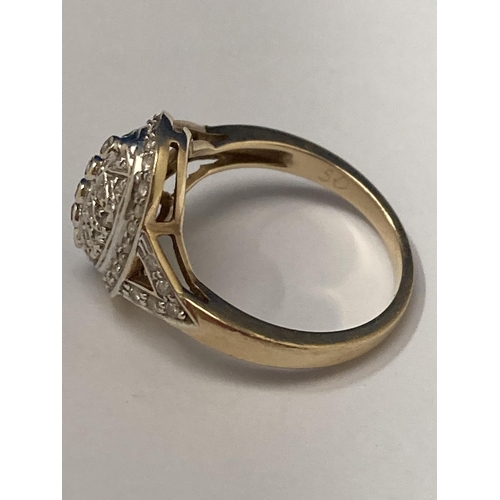 505 - A MARKED 9 CARAT YELLOW GOLD RING WITH DIAMONDS SET IN A RAISED DESIGN SIZE P/Q GROSS WEIGHT 4.41 GR... 