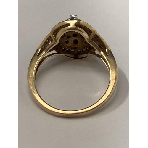 505 - A MARKED 9 CARAT YELLOW GOLD RING WITH DIAMONDS SET IN A RAISED DESIGN SIZE P/Q GROSS WEIGHT 4.41 GR... 