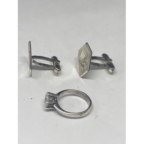 516 - A PAIR OF MARKED STERLING SILVER CUFFLINKS AND A 925 RING WITH LARGE SOLITAIRE CLEAR STONE SIZE M/N