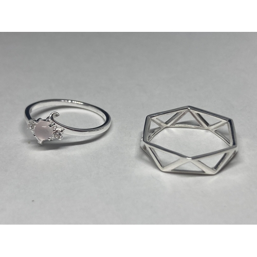 528 - FOUR VARIOUS SILVER RINGS