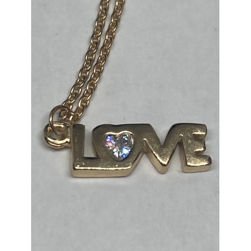 530 - THREE SILVER NECKLACES WITH PENDANTS TO INCLUDE A GOLD PLATED 'LOVE'