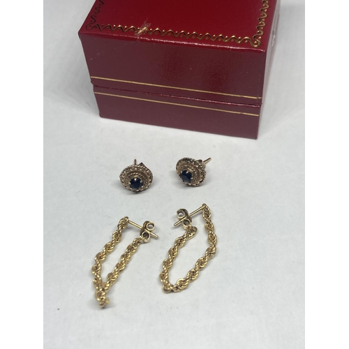 537 - TWO PAIRS OF MARKED 9 CARAT GOLD EARRINGS TO INCLUDE A ROPE DROP DESIGN AND A STUD WITH CENTRE GARNE... 