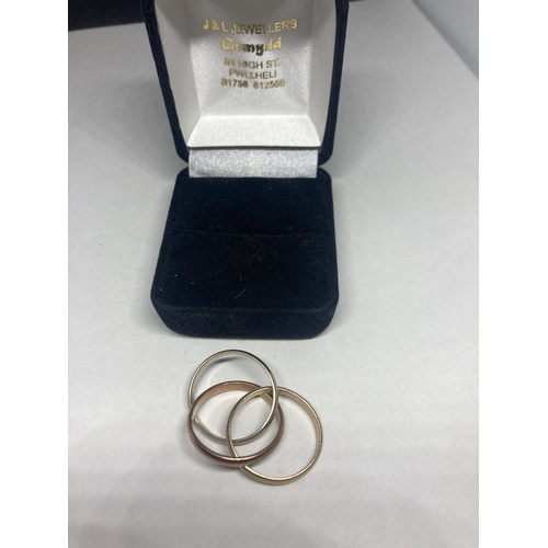 538 - A MARKED 9 CARAT TRI COLOUR THREE BAND RING SIZE Q GROSS WEIGHT 6.3 GRAMS IN A PRESENTATION BOX