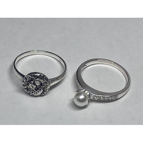 541 - FOUR VARIOUS SILVER RINGS