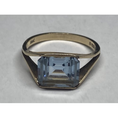 546 - A MARKED 9 CARAT LONDON YELLOW GOLD RING WITH A LARGE AQUA MARINE STONE SIZE P GROSS WEIGHT 3.12 GRA... 