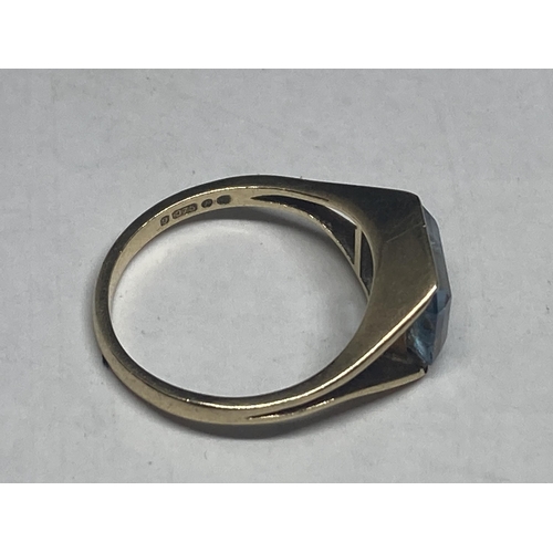 546 - A MARKED 9 CARAT LONDON YELLOW GOLD RING WITH A LARGE AQUA MARINE STONE SIZE P GROSS WEIGHT 3.12 GRA... 