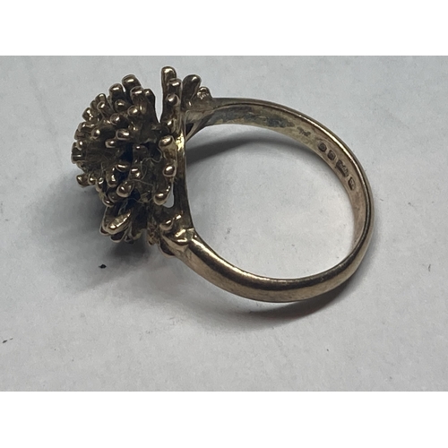 554 - A MARKED 9 CARAT GOLD BRUTALIST RING SIZE J GROSS WEIGHT 4.6 GRAMS IN A PRESENTATION BOX