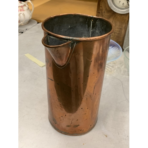 105 - A VINTAGE SOLID COPPER PITCHER, HEIGHT 27CM