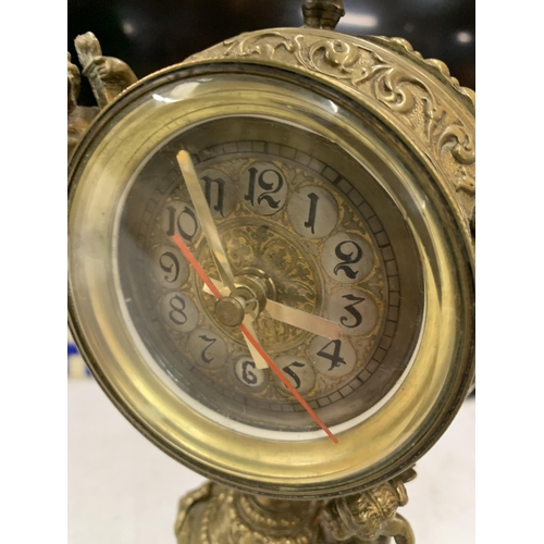 113 - A VINTAGE BRASS CHERUB MANTLE CLOCK, HEIGHT 29CM