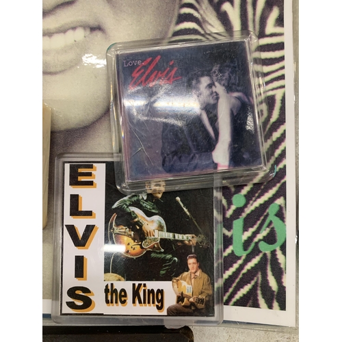 121 - A COLLECTION OF ELVIS PRESLEY ITEMS TO INCLUDE TINS, PRINTS, COASTERS, A BAR OF SOAP, ETC