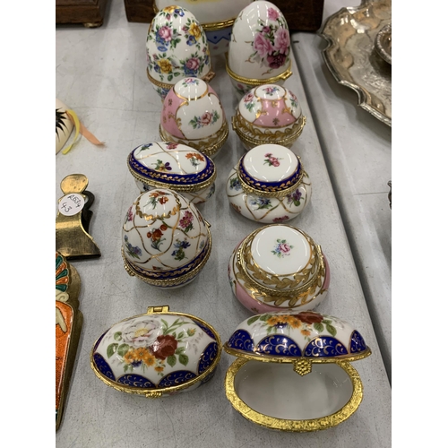 131 - ELEVEN FLORAL CERAMIC TRINKET BOXES TO INCLUDE A LARGE ONE WITH RABBIT DESIGN AND EGG SHAPED