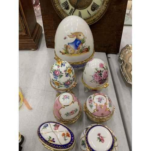 131 - ELEVEN FLORAL CERAMIC TRINKET BOXES TO INCLUDE A LARGE ONE WITH RABBIT DESIGN AND EGG SHAPED